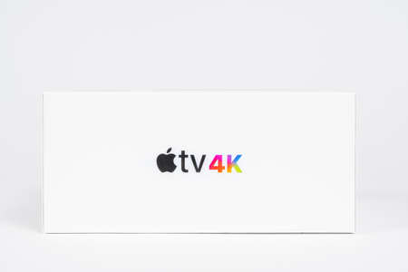 May 29, Rostov, Russia: Close box with unpacked Apple TV 4K console of the new generation lies on a white background, front view, copy space for advertising textのeditorial素材