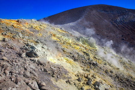 Sulfur gas coming out of the volcanic crater on the volcano islandの写真素材