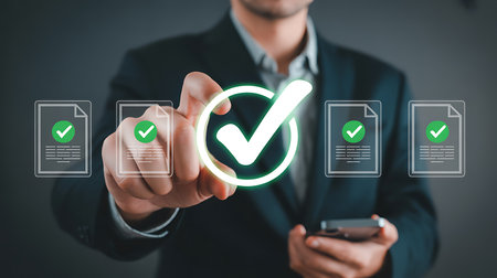 A person in a suit touches a glowing green checkmark on a digital interface showing multiple documents.の素材