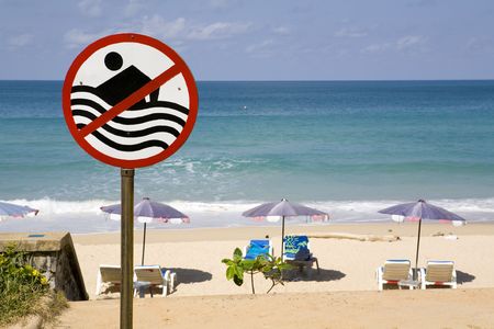 No swimming sign at a beachの写真素材