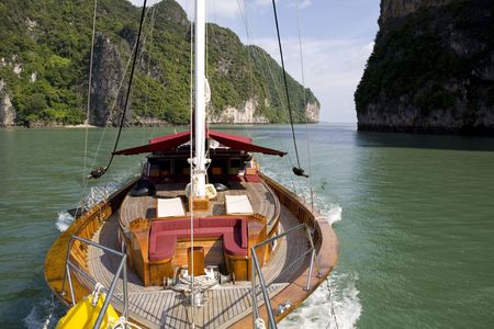 Beautiful wooden yacht on on the oceanの写真素材