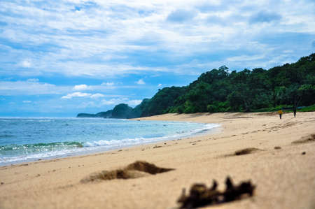 Panorama of long sand beach in the south of Malang cityの写真素材