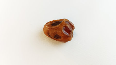 Dried dates on white background. Top view. Close up.