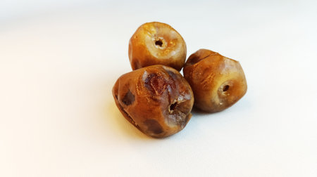 Dates on white background. Close-up of dried dates.