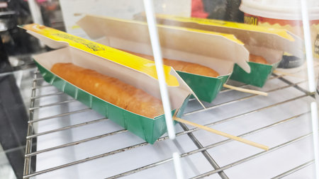 Ready-to-eat sausages in boxes are sold at street food markets, Semarang, Indonesiaの写真素材