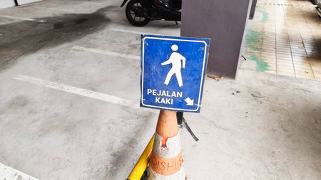 Pedestrian crossing sign in the parking lot, Semarang, Indonesia.の写真素材