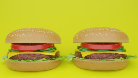Two hamburgers on a yellow background. Close-up.の写真素材