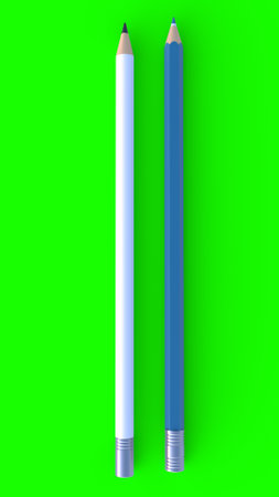 two different kinds of pencils with green backgroundの写真素材