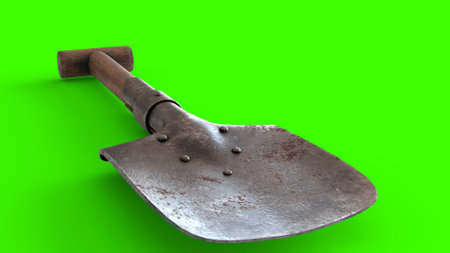 trench shovel with green backgroundの写真素材