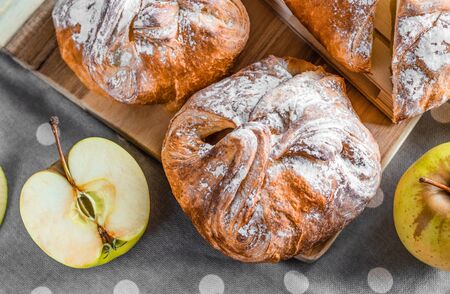 apple bun (pie) with powder sugar