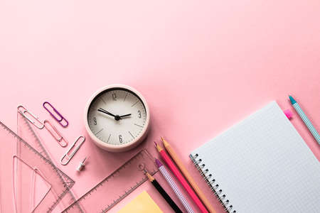 Back to school concept. School and office supplies on pink backgroundの写真素材