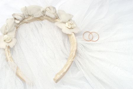 Wedding veil with rings on white backgroundの写真素材