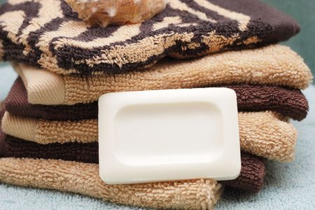 pile of towels with soapの写真素材