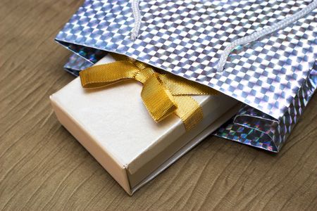 Gift's boxes - silver and off-white with gold ribbonの写真素材