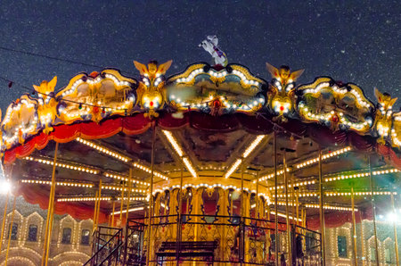 Christmas market in the evening with snowfall in Moscow. High quality photoの写真素材