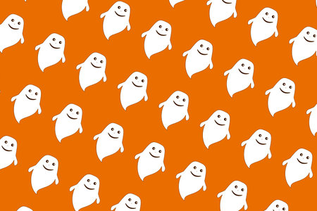 Cute little long ghost print for halloween on orange backgroundの写真素材