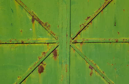 A metallic green gate for background backdrops or copy spaceの写真素材