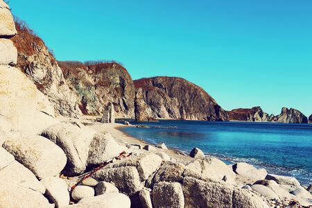 Beautiful seascape of East sea with stones and mountains の写真素材