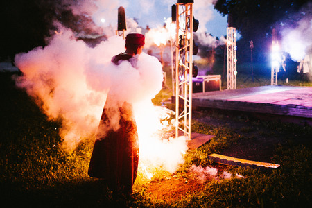 Girl completely in smokeの写真素材