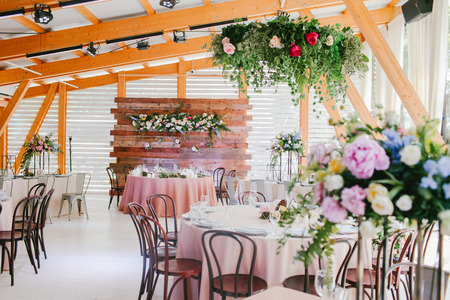 Wedding reception decorated with flowersの写真素材