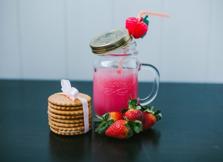 Strawberry fruit drink. Creamy cookiesの写真素材