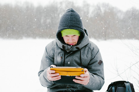Man looking at Tabletの写真素材