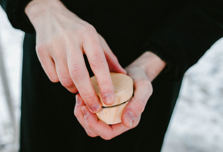 Man holding a small box for ringsの写真素材