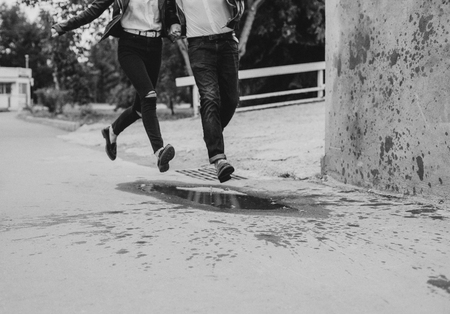 Loving running through puddles. Love time. Funの写真素材