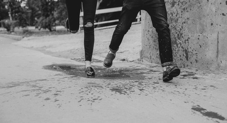 Loving running through puddles. Love time. Funの写真素材