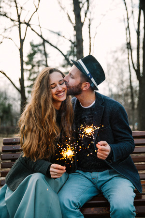 A man and woman held sparkler. Love timeの写真素材