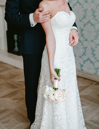 Bride and groom hugging each other. Sweetの写真素材