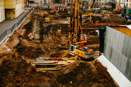 Construction cranes and Brown. Moscow time. Workの写真素材