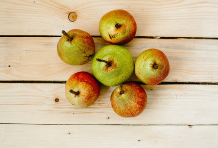 Pears on wood backgroundの写真素材