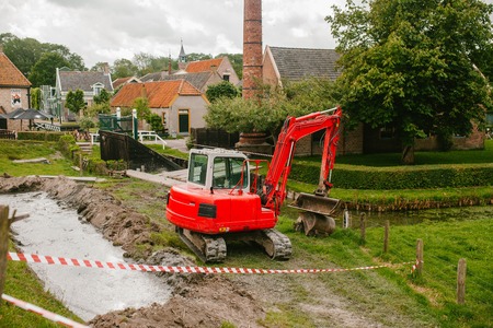 Red Tractor in the village. Natureの写真素材