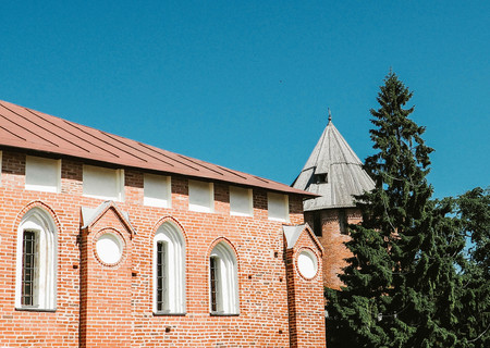 The old brick building on the sky background