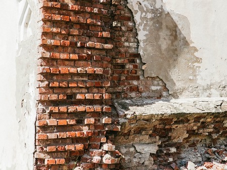 Destroyed a brick wallの写真素材