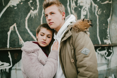 young girl hugging a guyの写真素材
