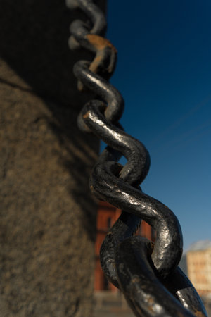 chain on a background of the blue sky, closeup of photo