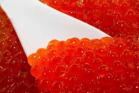 Red caviar on the spoonの写真素材