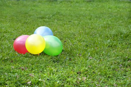 balloons on a grassの写真素材