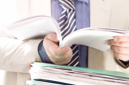 businessman reading contracts. Small DOF
の写真素材