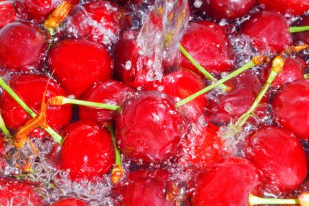 Fresh cherry in waterの写真素材