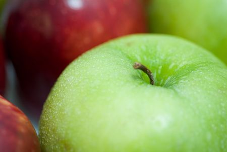 Fresh apple with drops of water.の写真素材