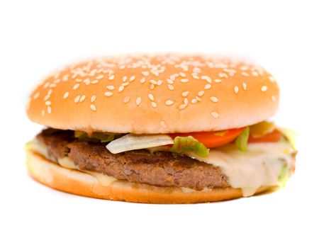 Cheese burger with lettuce and tomato,over a white backgroundの写真素材