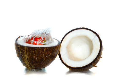 Fruit and coco with poured water.の写真素材