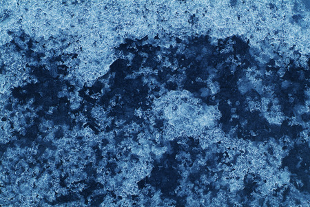 Close-up ice, blue, with great frozen patterns and textures.