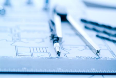 Business accessories on background of diagramsの写真素材