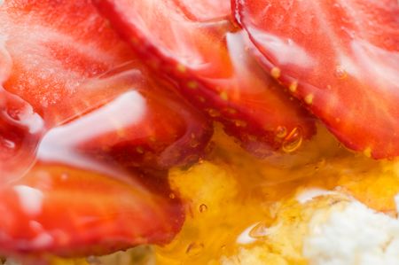 Cottage cheese with a strawberry and honeyの写真素材