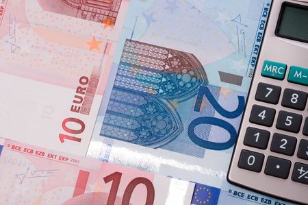 Calculator with moneyの写真素材