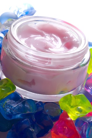 Cosmetic pink cream with glassの写真素材